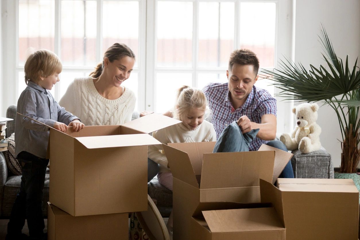 Family organizing their home together